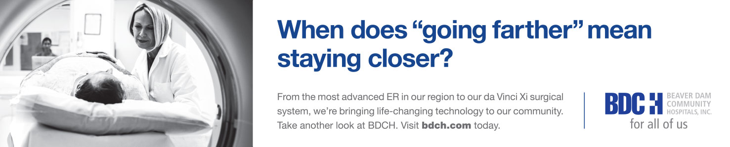 Beaver Dam Community Hospital print ad of an employee preparing a patient for an MRI; When does going farther mean staying closer?